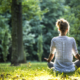 woman sitting alone outdoors