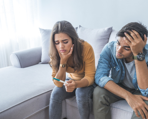 man and woman struggling with infertility